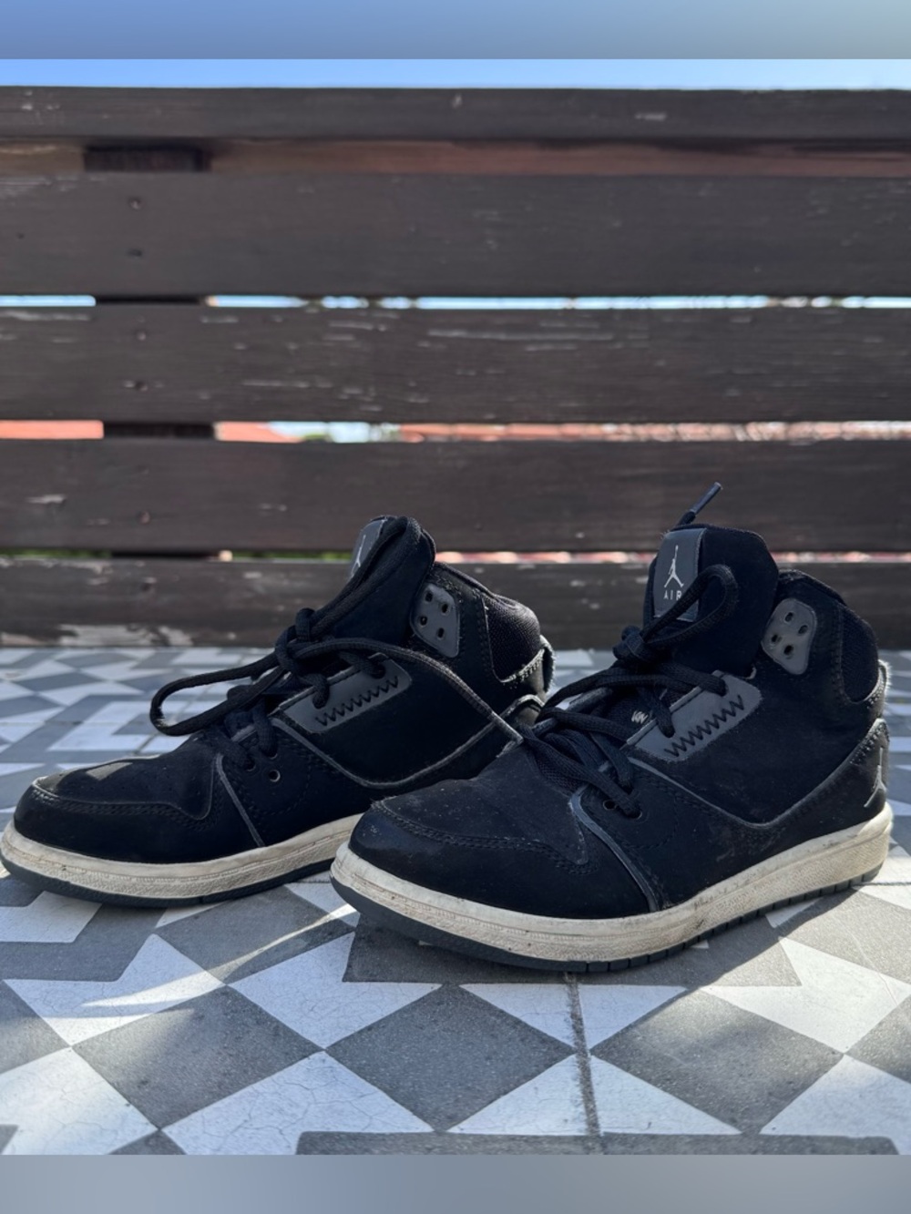 Kid’s Air Jordan Black High-Top Sneakers